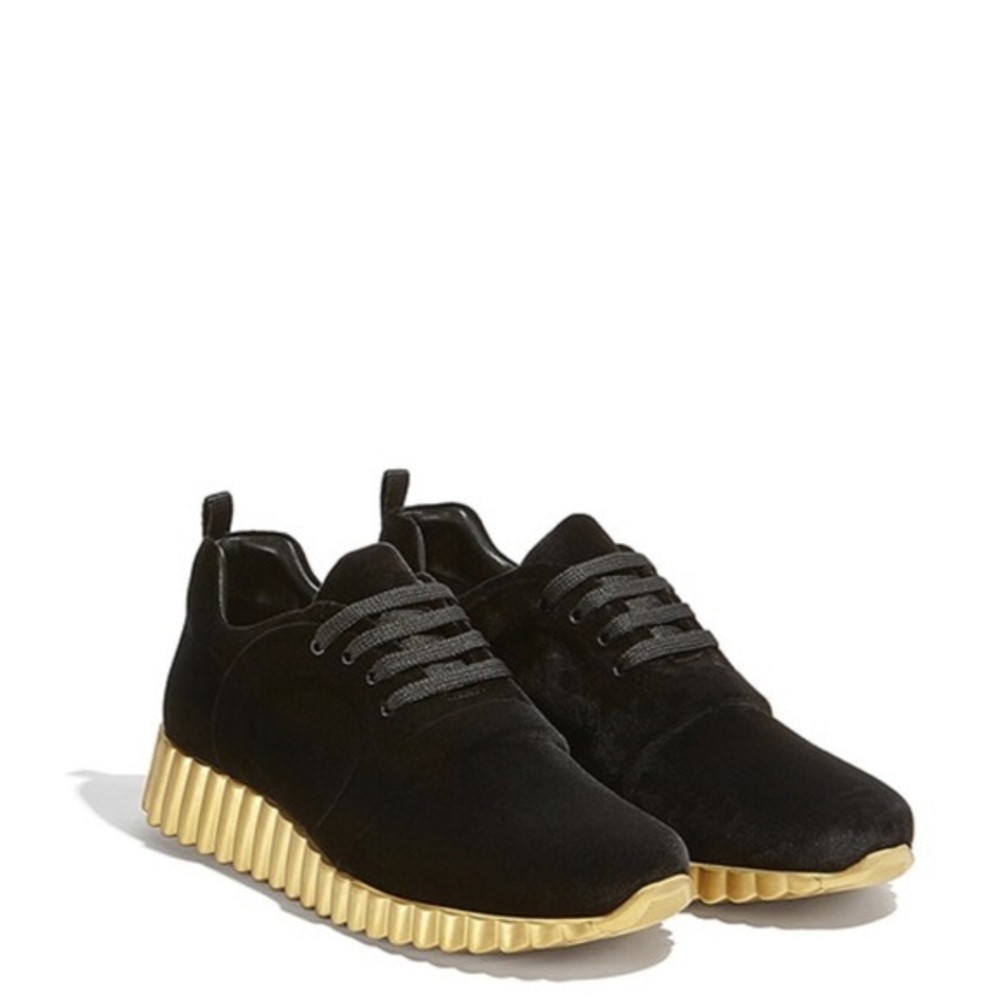 Salvatore Ferragamo Massa low top sneakers black and gold.